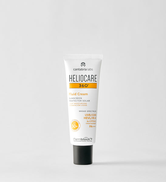Heliocare 360 fluid cream sunscreen in white tube with black cap, SPF 50+