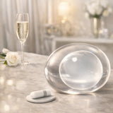 Allurion treatment kit with clear balloon and two small white capsule pieces